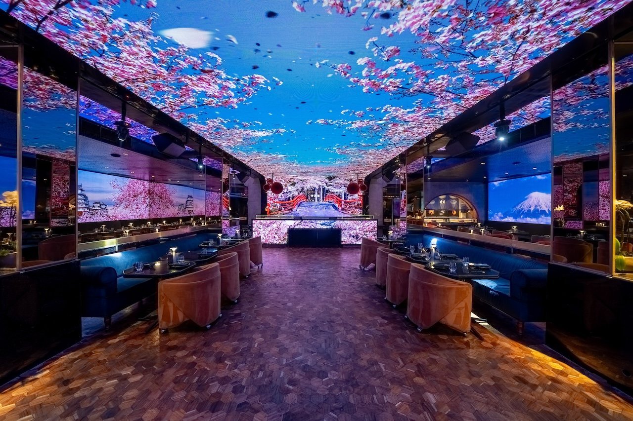 Interior of ShiShi Bali Restaurant with screen on the ceiling